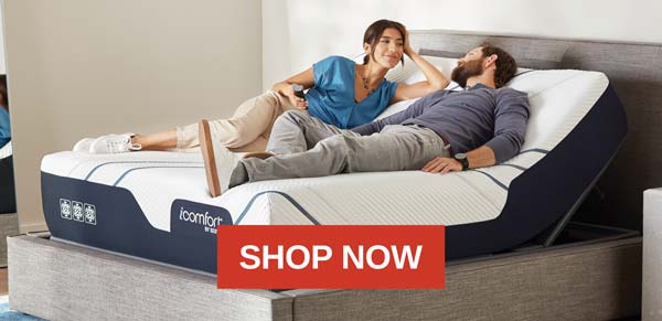 couple laying on adjustable iComfort mattress set