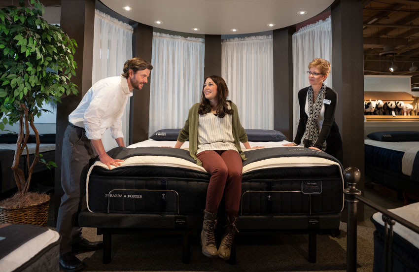 Woman shopping for a new mattress