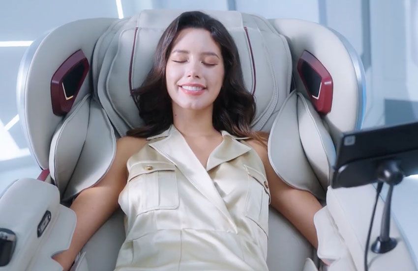 woman in cozzia massage chair