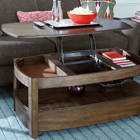 Lift top coffee table to bring a table to the sofa